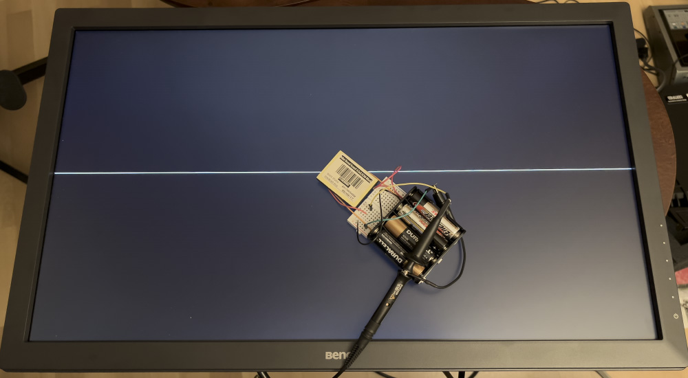 A single white line appearing on a BenQ gaming monitor, measured by a simple photodiode circuit.